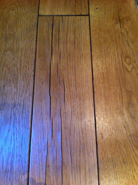 Why has my hardwood floor cracked?